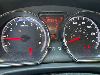 2012 Nissan Versa 1.6 SV - Interior Dashboard With Vehicle Running Image